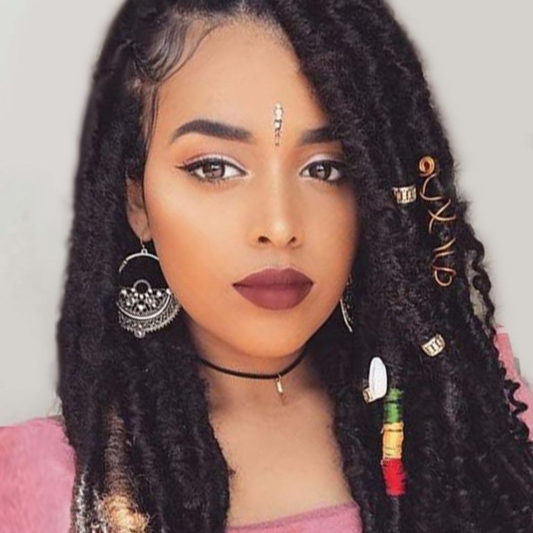 messy faux locs with accessories