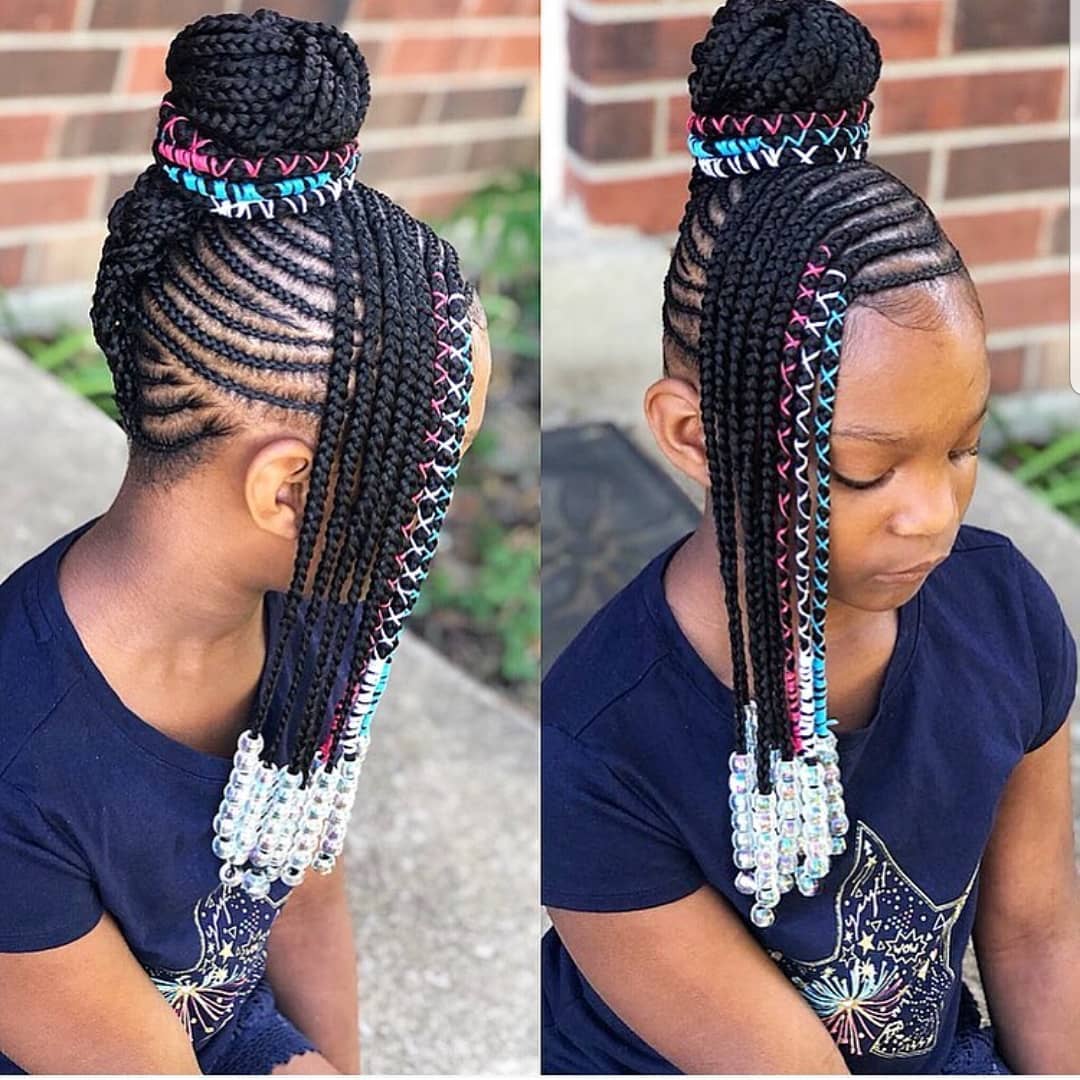 Patewo with curve nigerian kids hairstyle