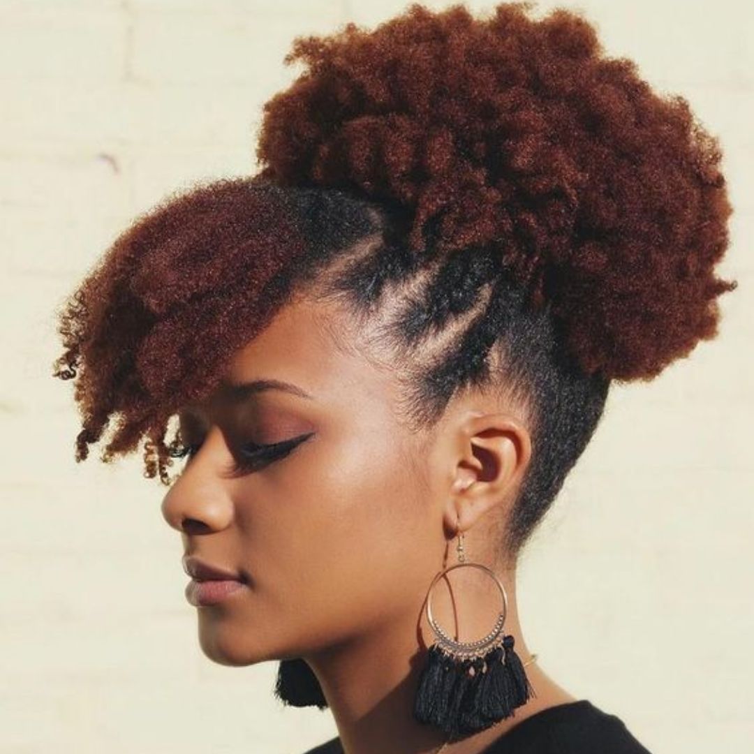 Afro puff with bangs and side twists