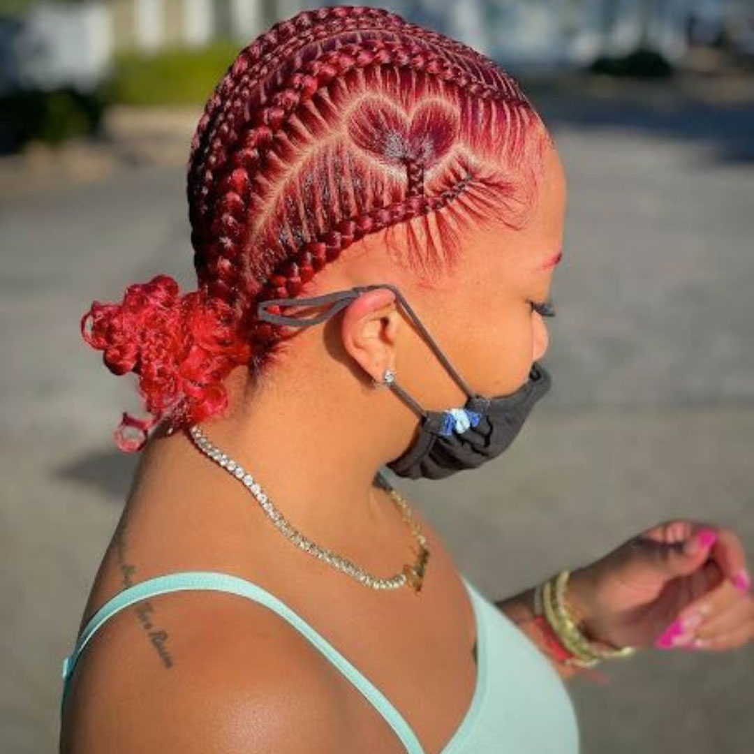 red cornrows with heart on the side