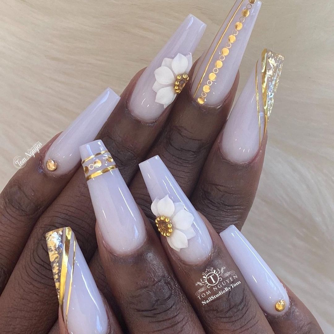 3d nailart in coffin-shaped nails on black women