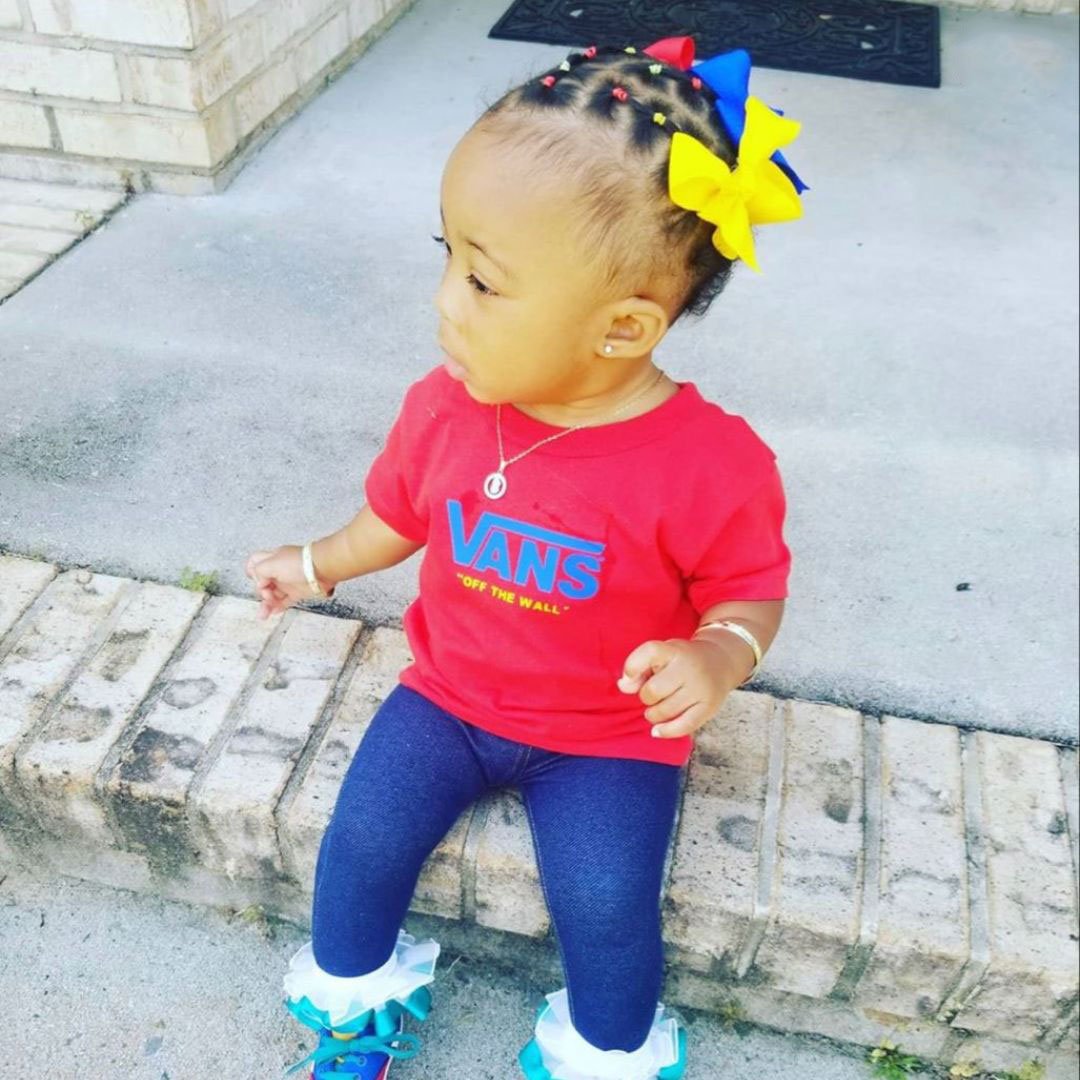 colorful rubber band hairstyle on black babies