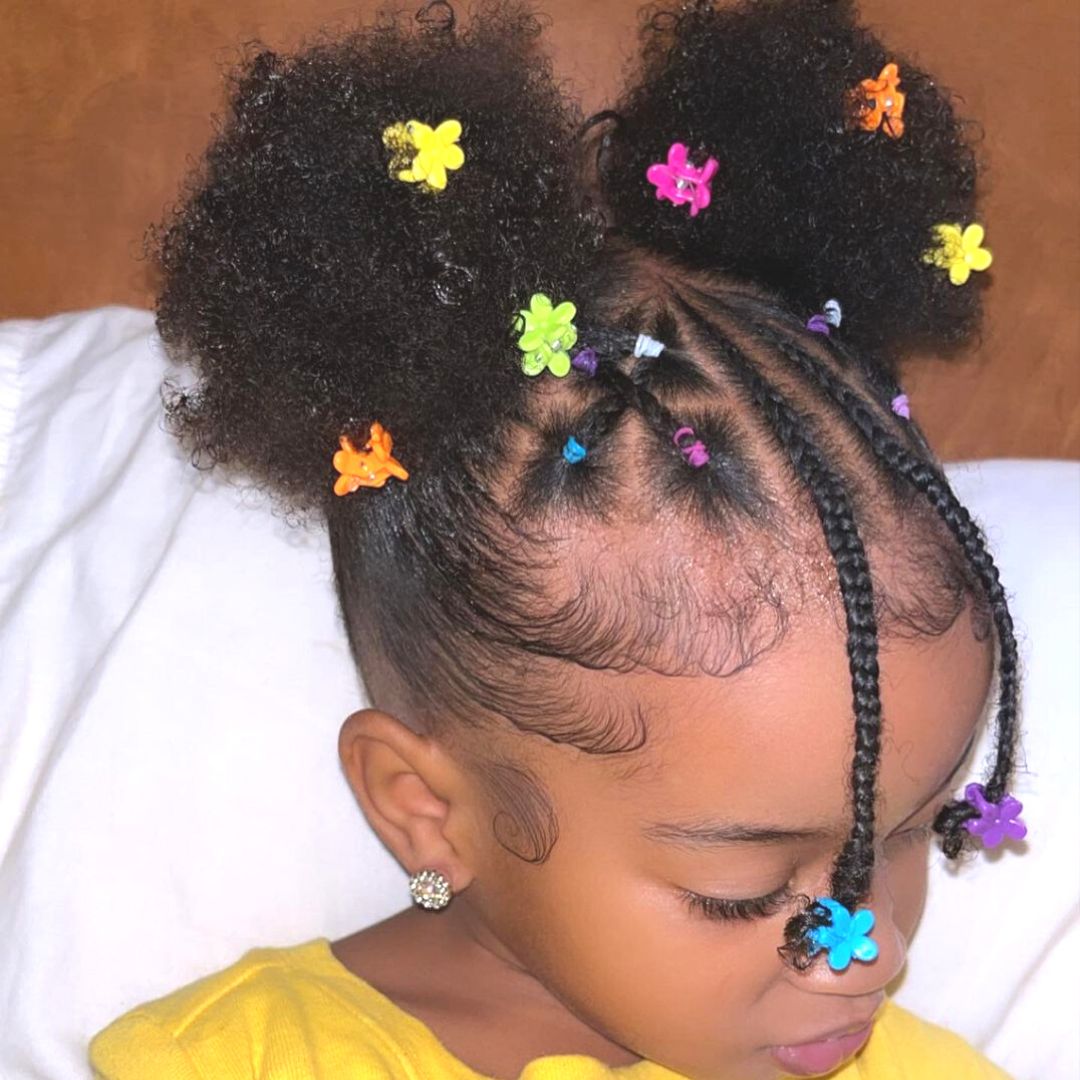 cute puff hairstyle with colorful clips