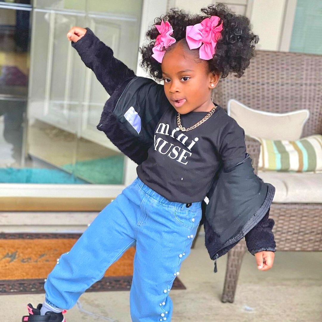 giant puff hairstyle on black kid
