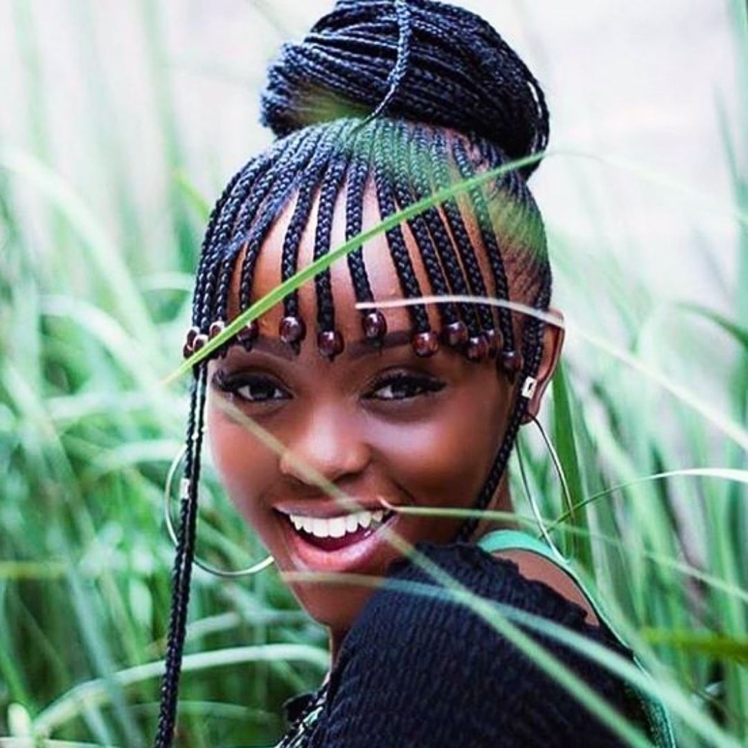 cornrows with full bangs hairstyle on black women