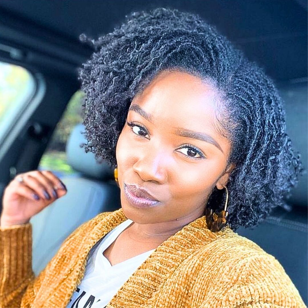 sided sisterlocs hairstyle on women