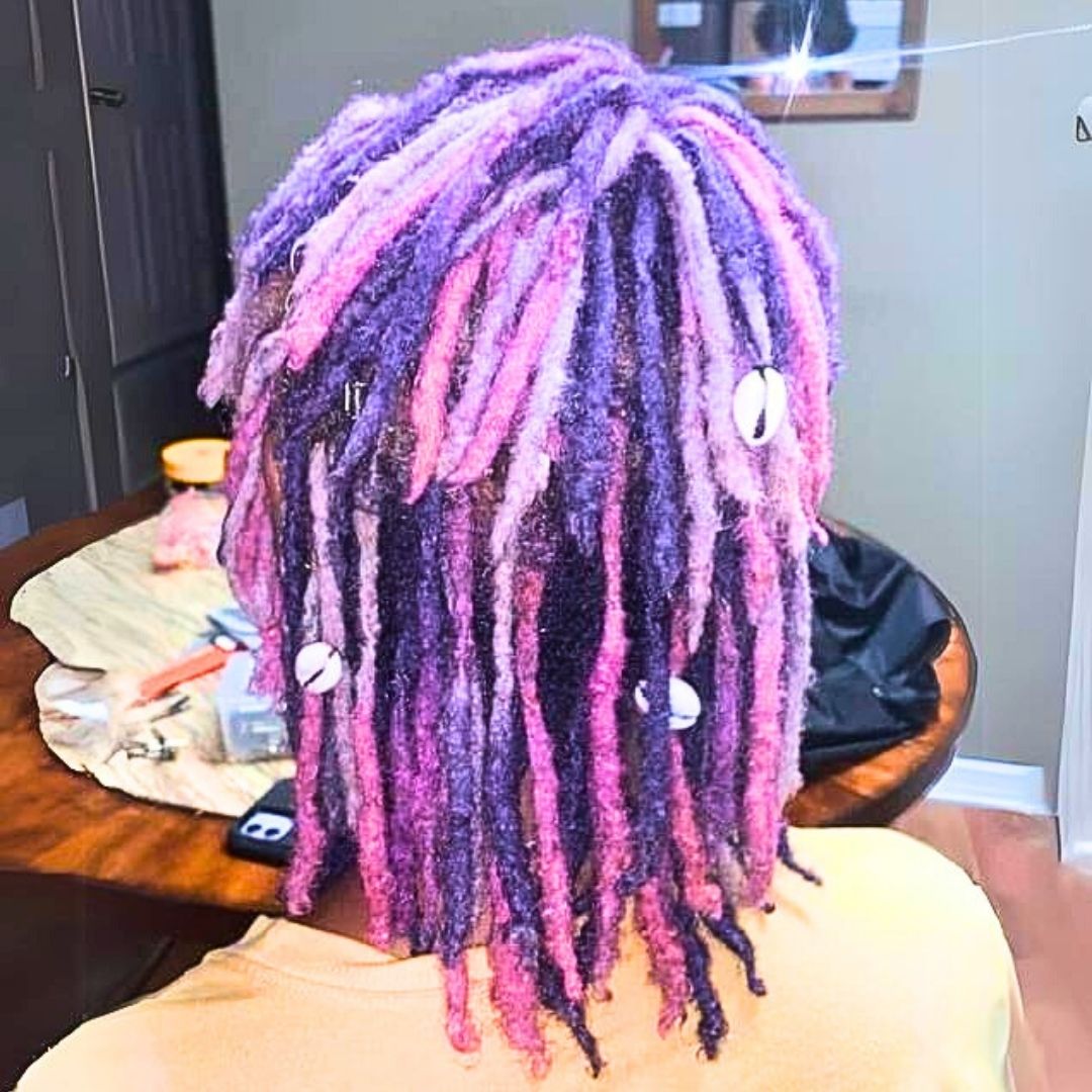 Purple locs hairstyle