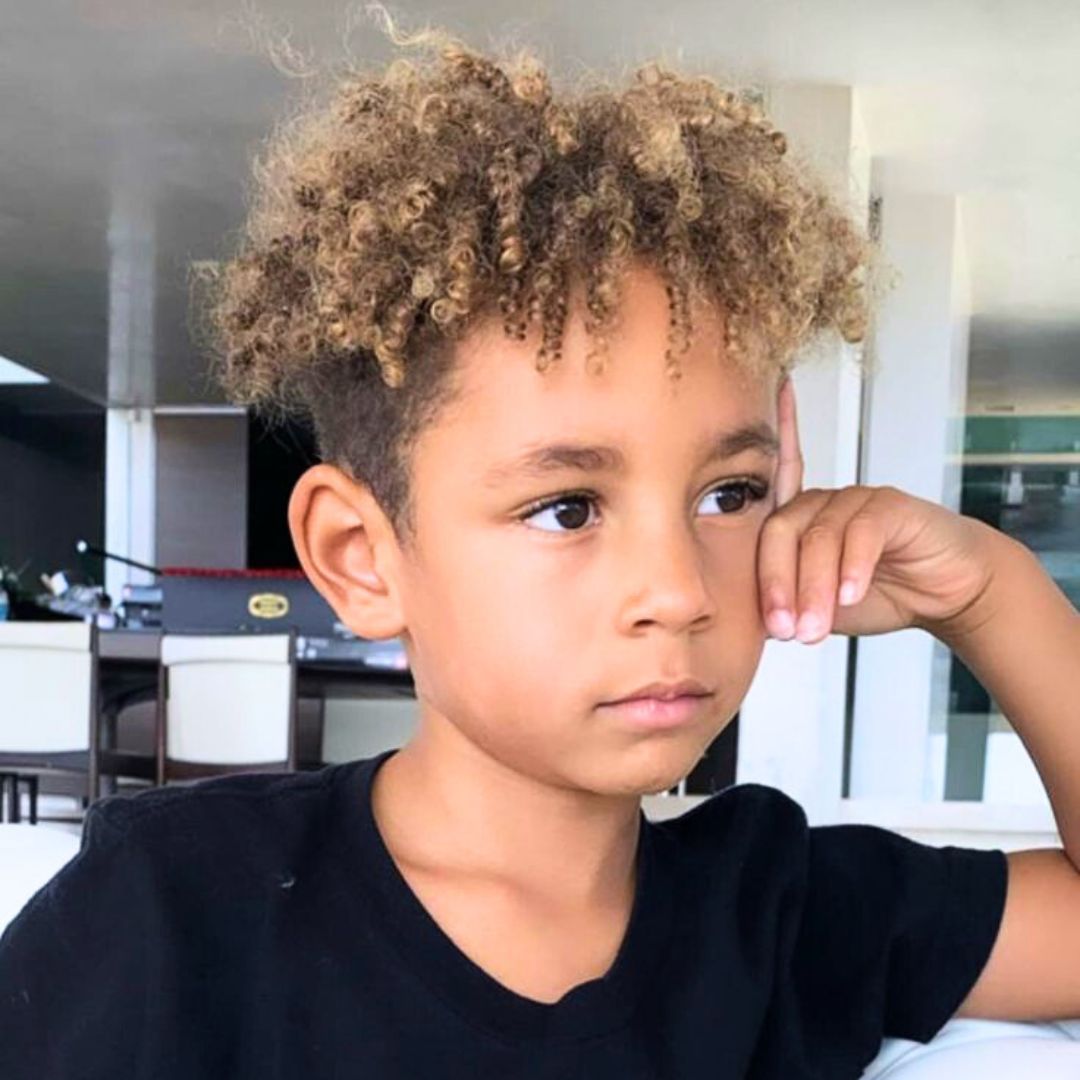 Curly haircut with undercut on black boys
