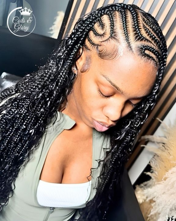 Side-swept feed-in stitch braids blended with boho loose curls.