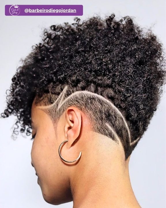 Natural black coiled frohawk for women featuring sweeping geometric razor line art.
